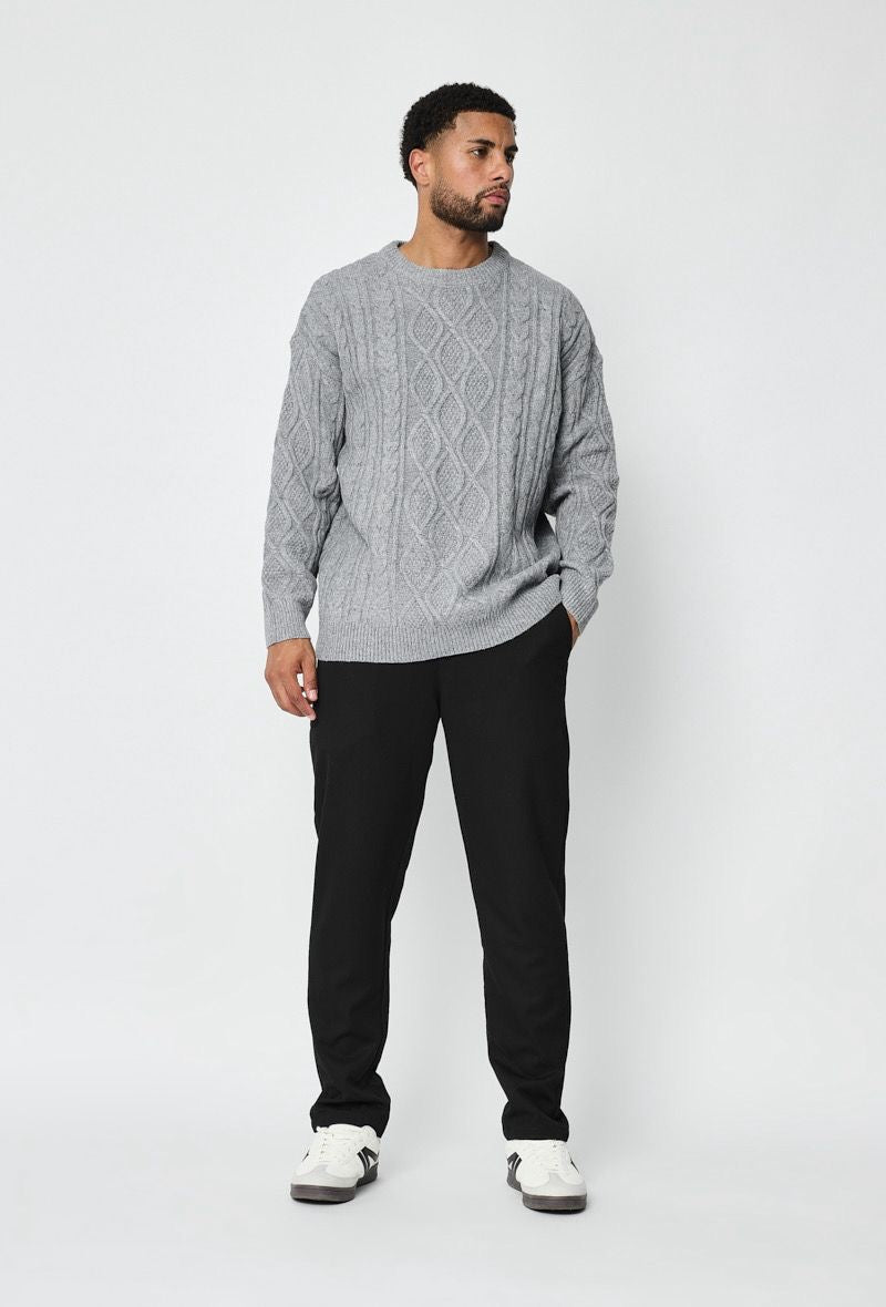 Pull Torsadé Signature